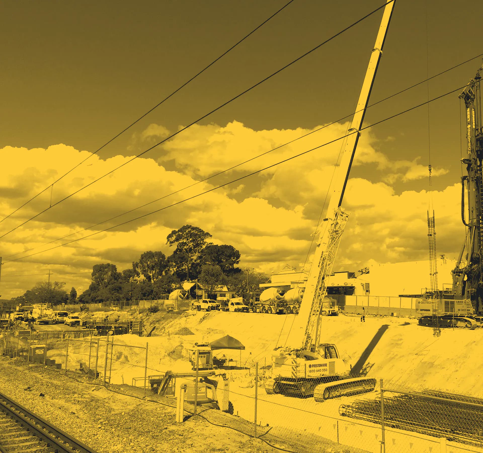 A crawler crane and piling rig at the Bayswater Station works in Perth